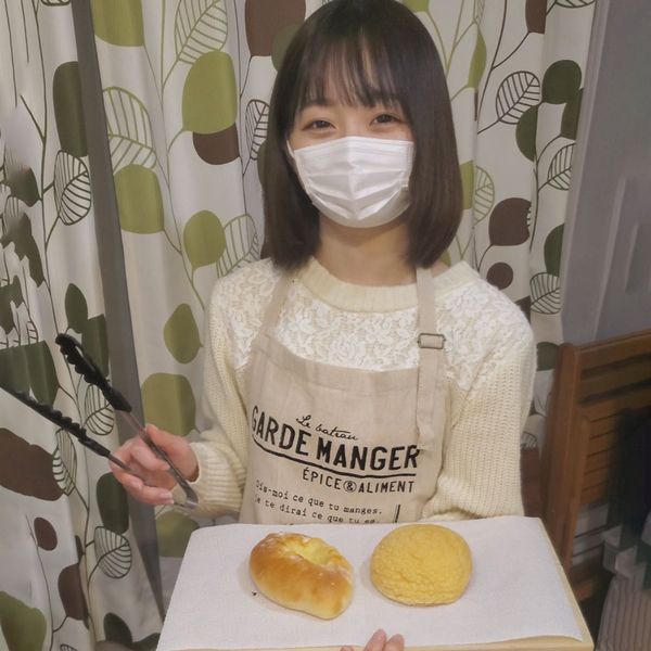 A poster girl of a bakery raw after eating delicious bread